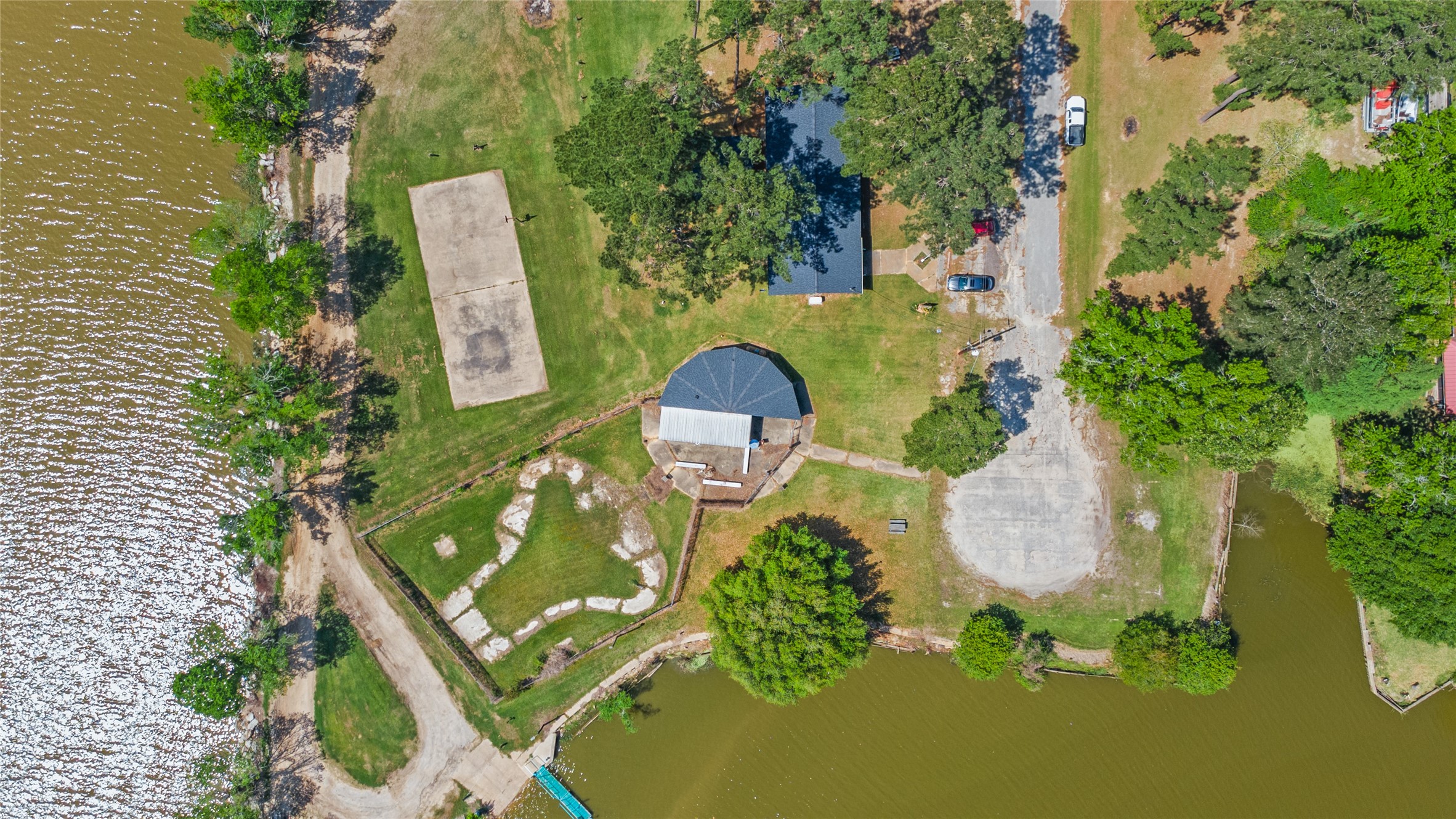 Tbd Sportsman Drive Trinity, TX 75862 - Photo 13 of 19 an aerial view of a house with swimming pool and garden