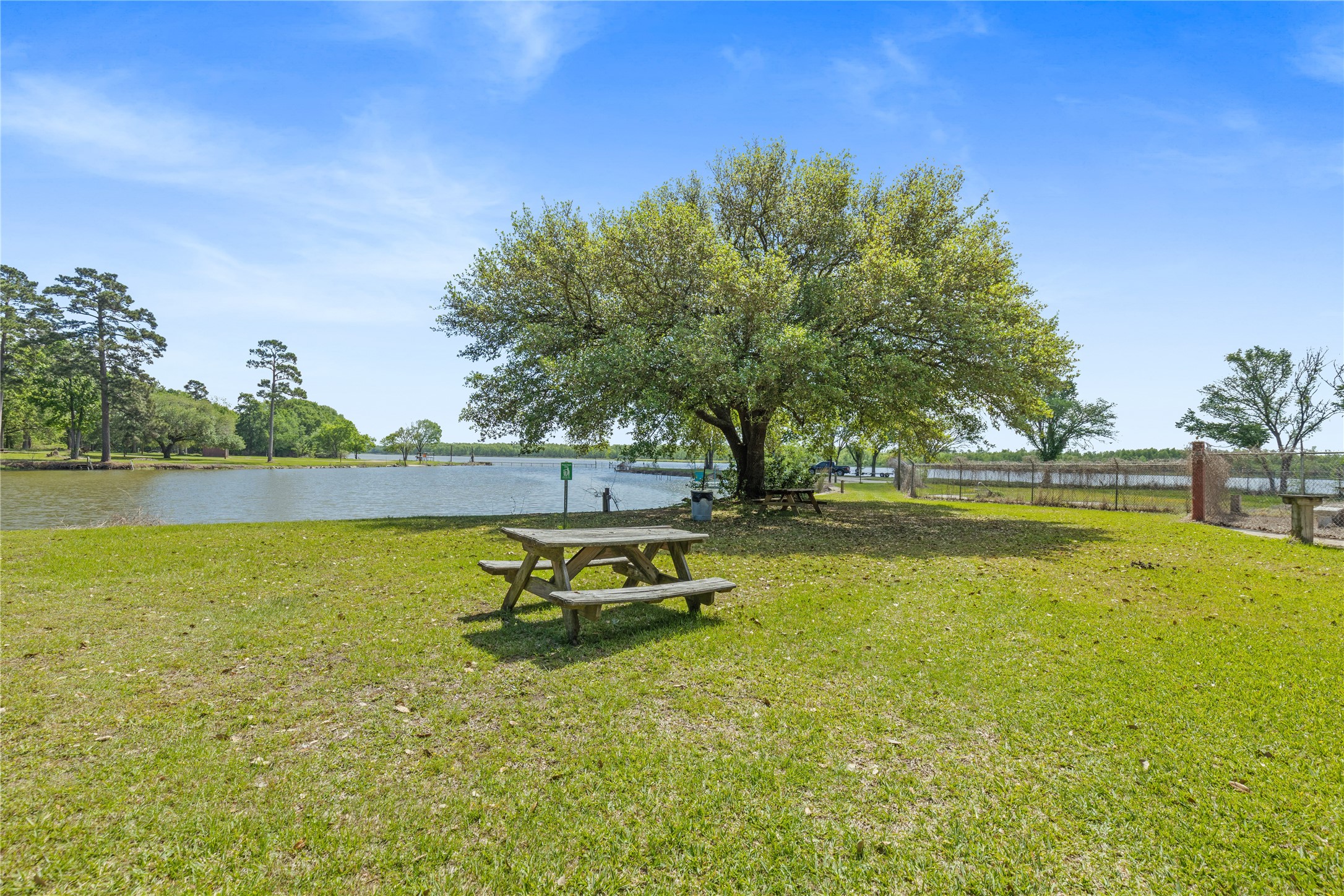 Tbd Sportsman Drive Trinity, TX 75862 - Photo 16 of 19 a swimming pool with outdoor seating and yard