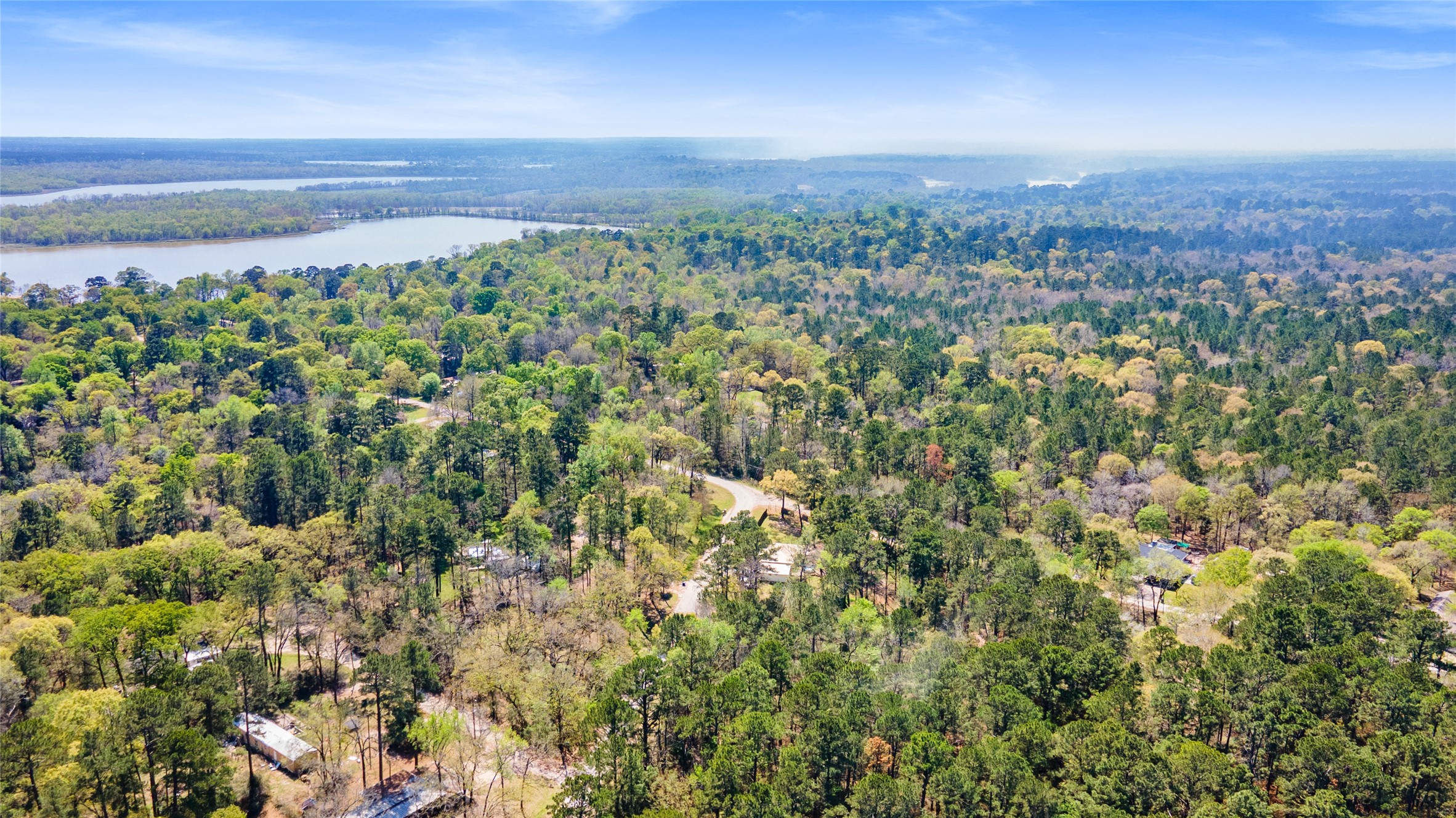Tbd Sportsman Drive Trinity, TX 75862 - Photo 18 of 19 a view of a city with lush green forest