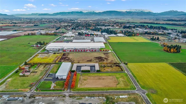 swimming pool view with a garden