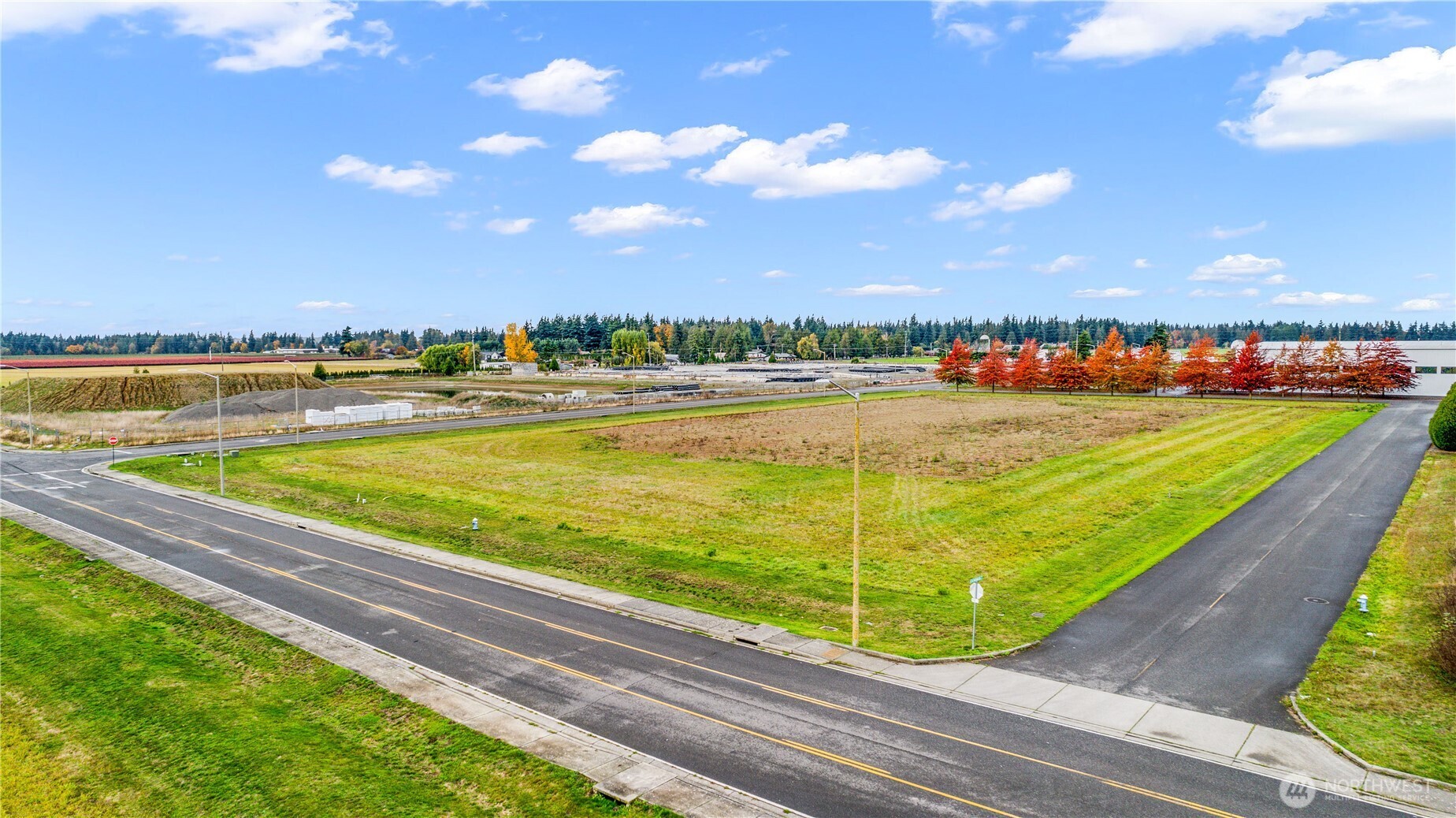 602 Redwood Road Lynden, WA 98264 - Photo 3 of 22 a view of a swimming pool and an outdoor seating