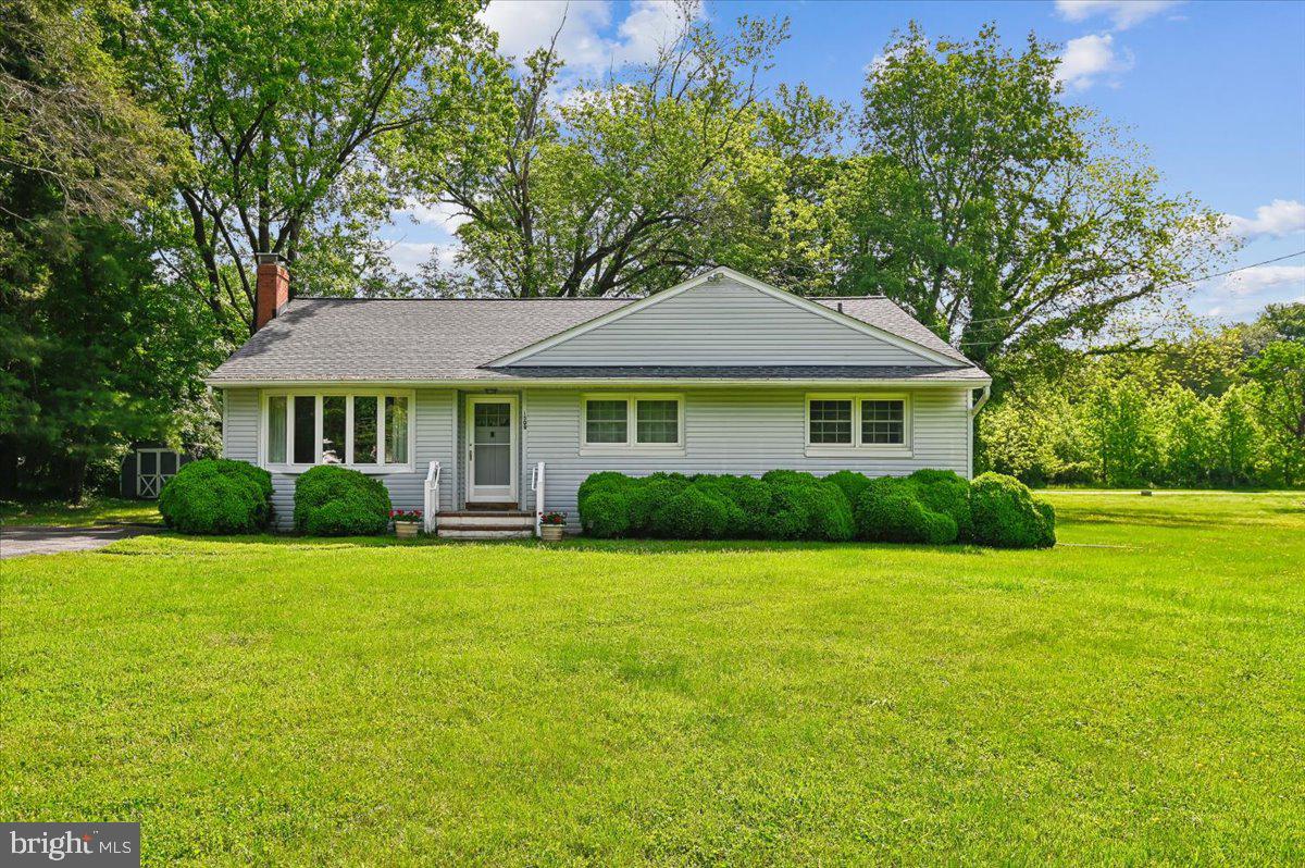 1509 Duvall Road Annapolis, MD 21409 - Photo 1 of 39 a front view of a house with a garden