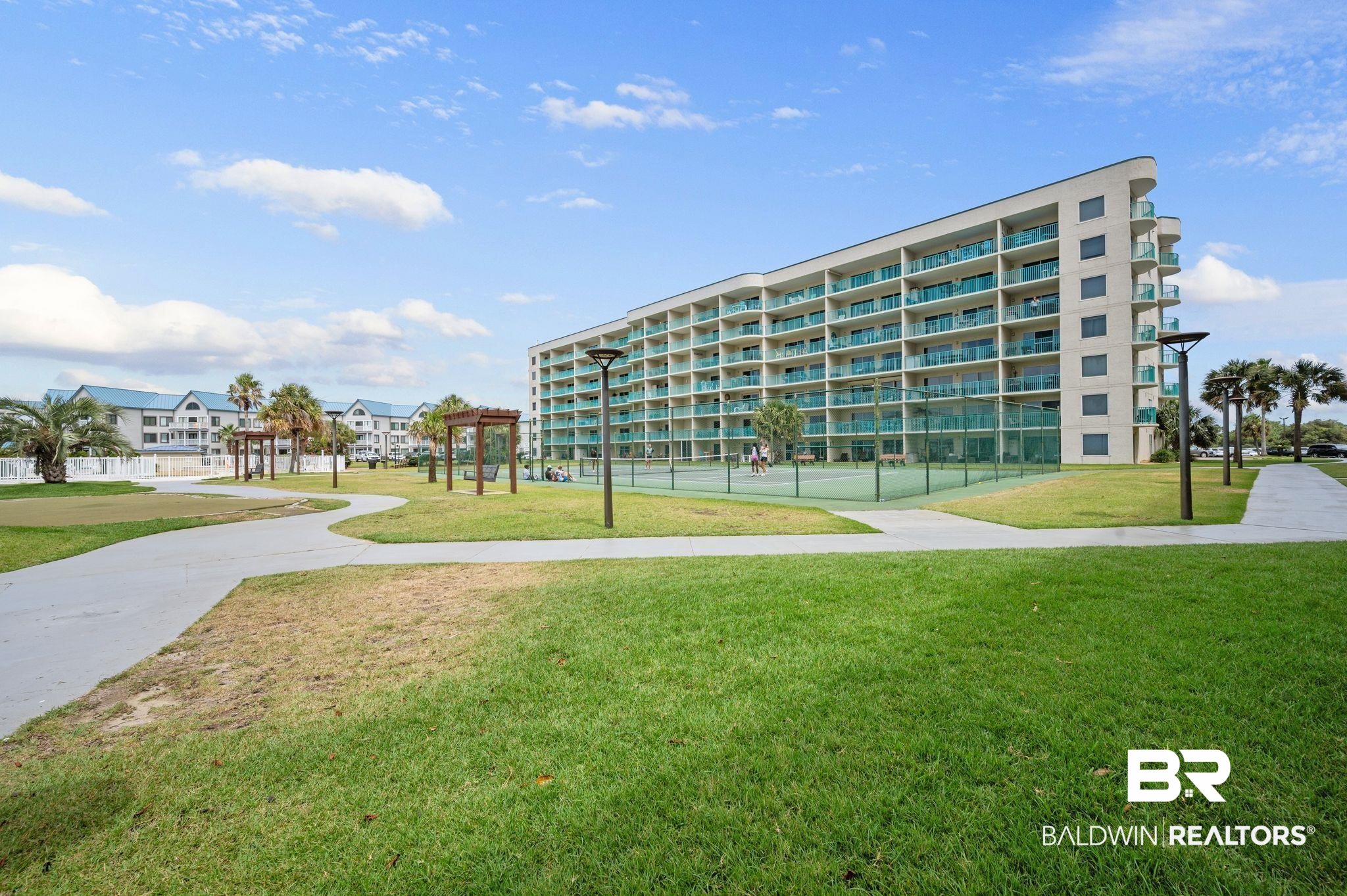 375 Plantation Road, Unit 5304 Gulf Shores, AL 36542 - Photo 36 of 42 View of community featuring a lawn