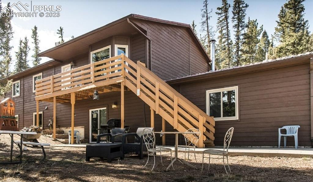 1313 Spring Valley Drive Divide, CO 80814 - Photo 25 of 25 a front view of a house with garage