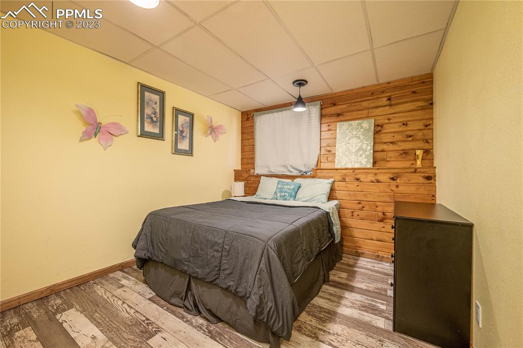 1313 Spring Valley Drive Divide, CO 80814 - Photo 10 of 25 a spacious bedroom with a bed and a cabinets