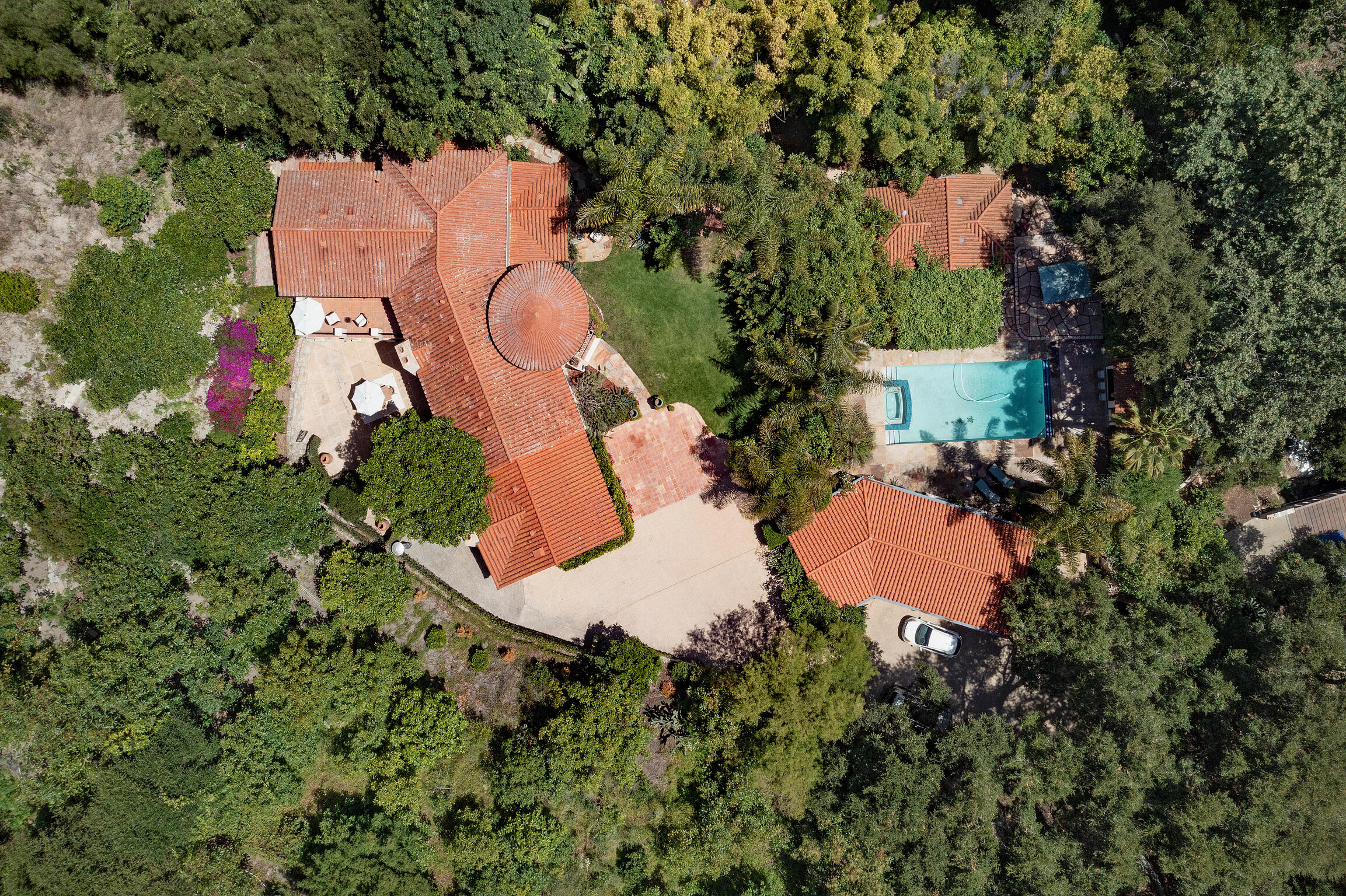 1493 Sycamore Canyon Road Montecito, CA 93108 - Photo 1 of 47 an aerial view of a house with a swimming pool yard and outdoor seating