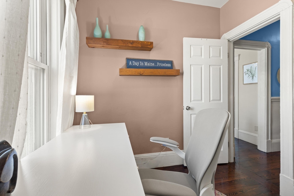 573 Bennington Street, Unit 2 Boston, MA 02128 - Photo 15 of 22 a bedroom with a bed and a couch