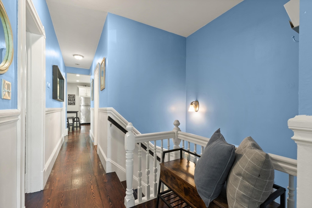 573 Bennington Street, Unit 2 Boston, MA 02128 - Photo 3 of 22 a view of a hallway with seating area