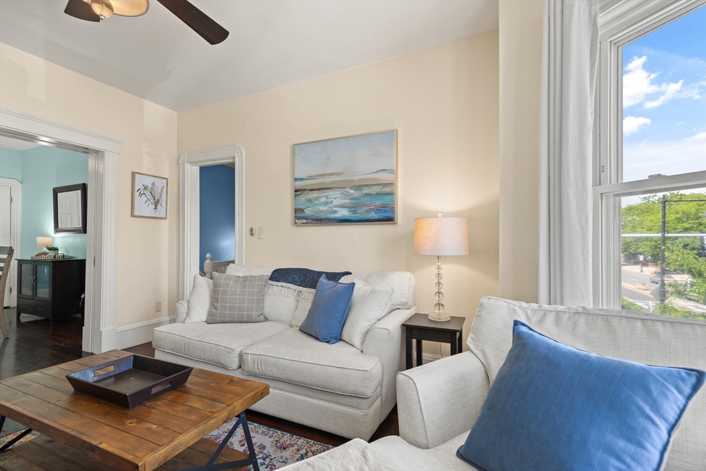 573 Bennington Street, Unit 2 Boston, MA 02128 - Photo 6 of 22 a living room with furniture and a window