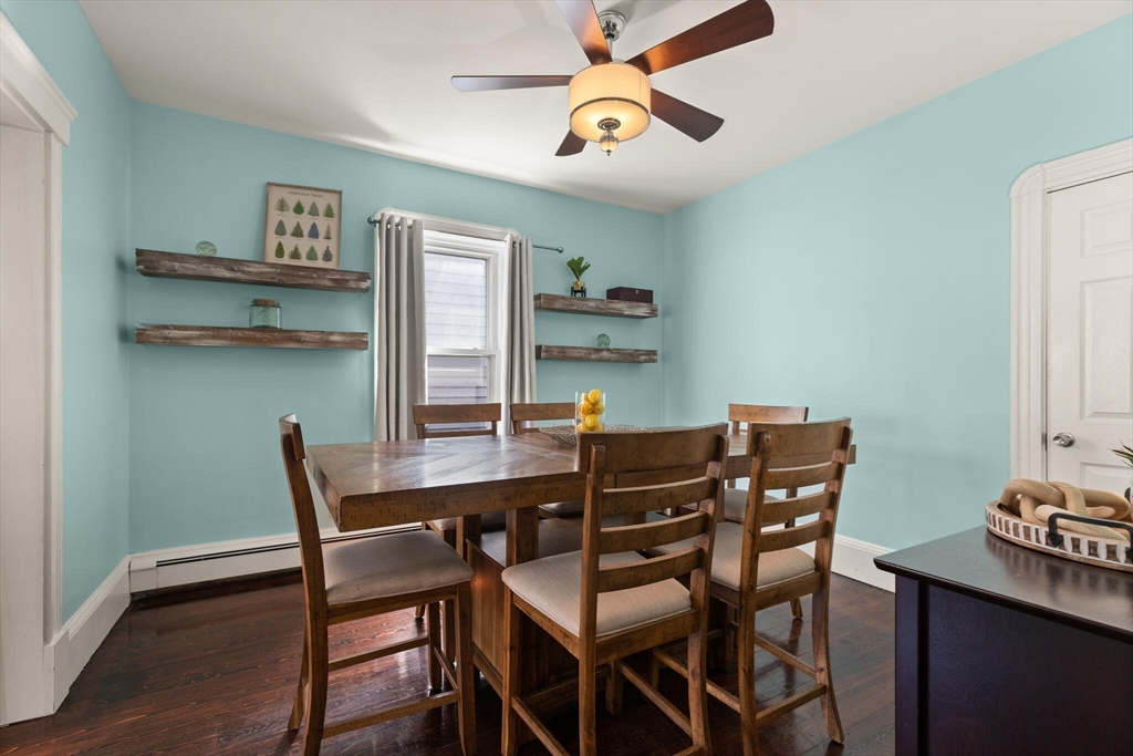 573 Bennington Street, Unit 2 Boston, MA 02128 - Photo 8 of 22 a view of a dining room with furniture and wooden floor