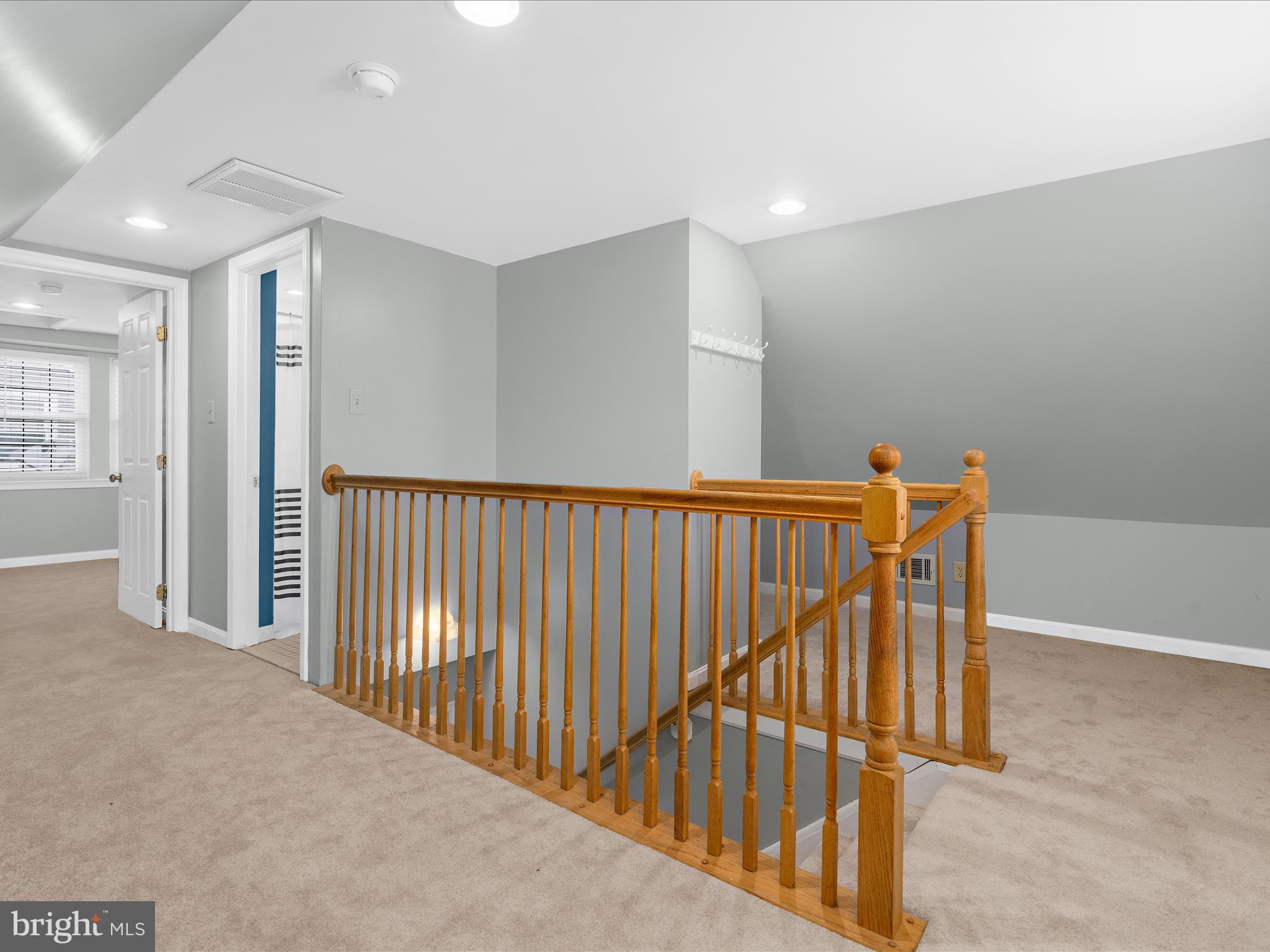 5521 Patrick Henry Drive Baltimore, MD 21225 - Photo 19 of 33 a view of a hallway with stairs