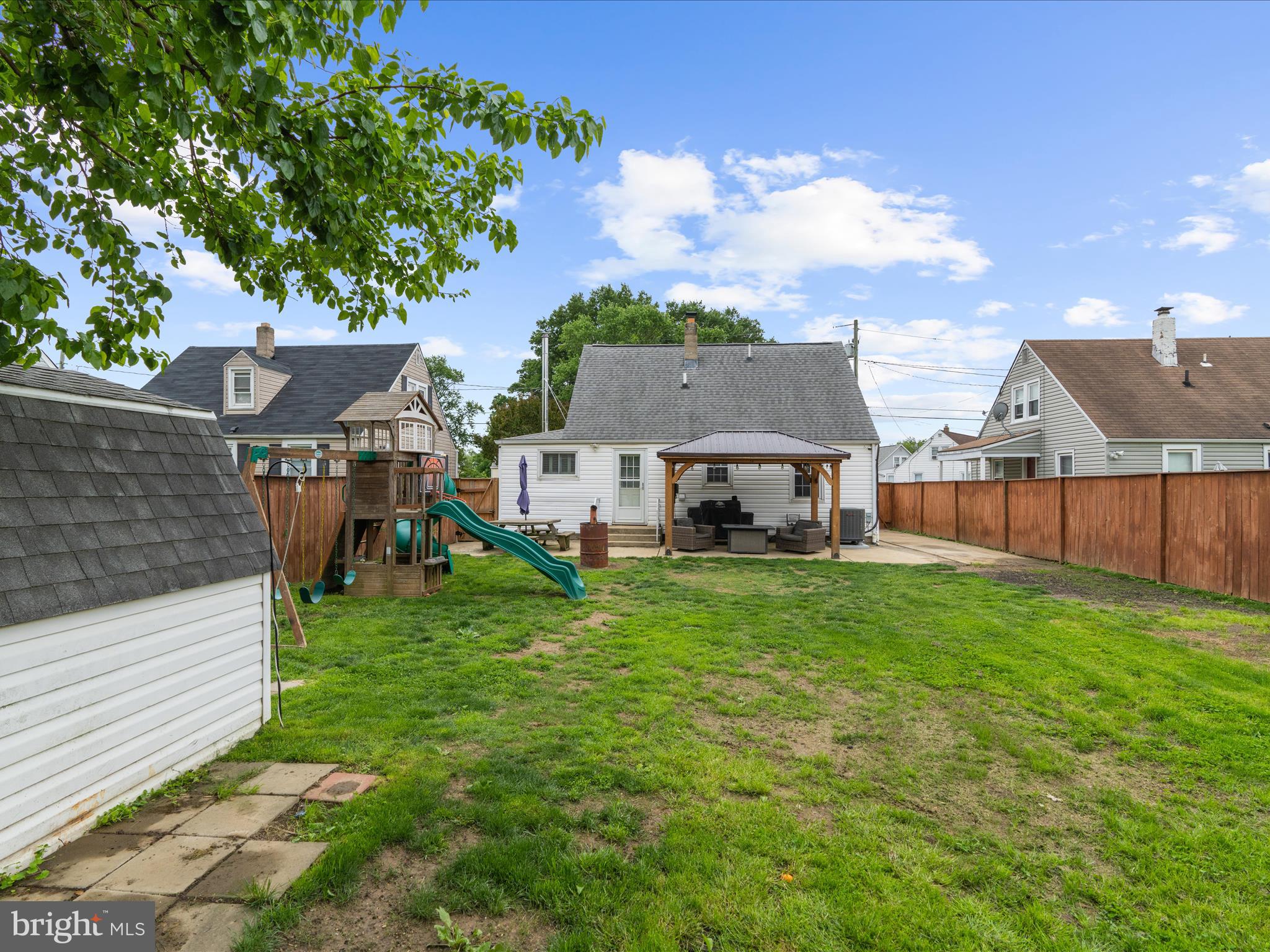 5521 Patrick Henry Drive Baltimore, MD 21225 - Photo 30 of 33 a view of a house with backyard and sitting area