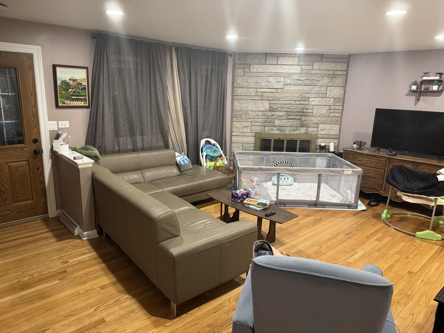 531 Glenshire Road Glenview, IL 60025 - Photo 6 of 12 a living room with furniture and a flat screen tv