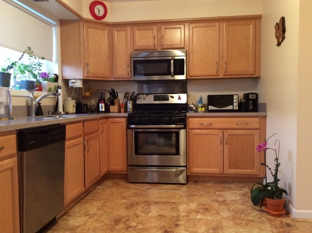 531 Glenshire Road Glenview, IL 60025 - Photo 7 of 12 a kitchen with a stove and a microwave