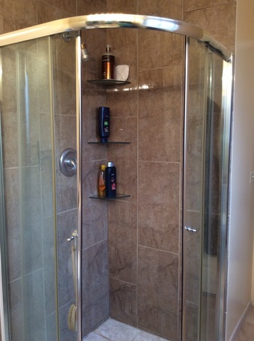 531 Glenshire Road Glenview, IL 60025 - Photo 9 of 12 a bathroom with a glass shower door