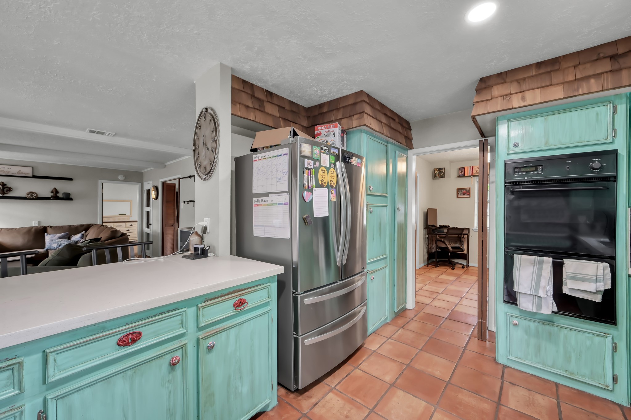 25610 Walnut Grove Circle Spring, TX 77380 - Photo 9 of 29 a kitchen with stainless steel appliances a refrigerator and a stove