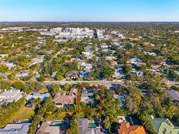 an aerial view of residential building and parking space