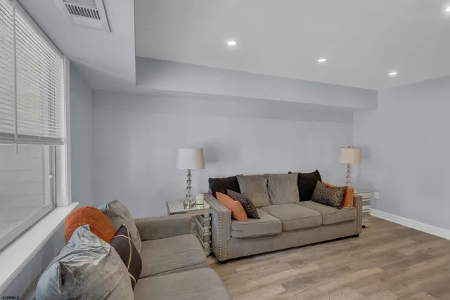 a living room with furniture and a couch