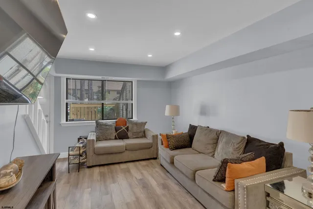 a living room with furniture and a couch