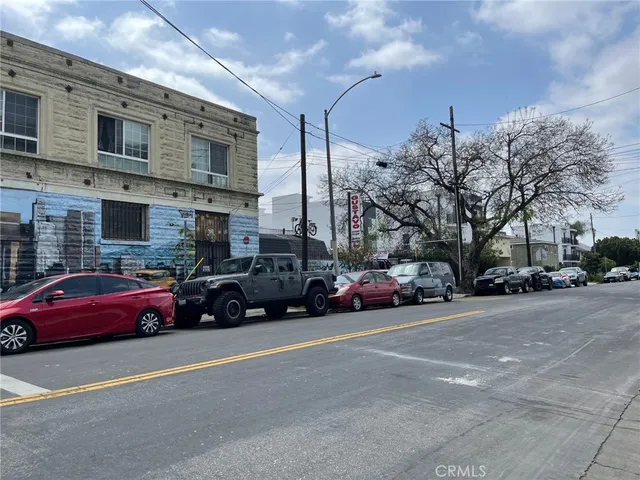 a view of a cars parked in front of a building
