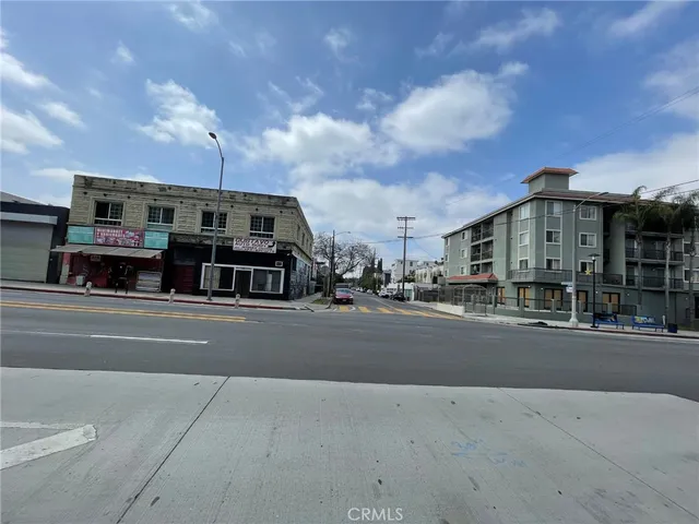 a view of a street with cars