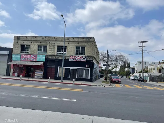 a view of a building with a street
