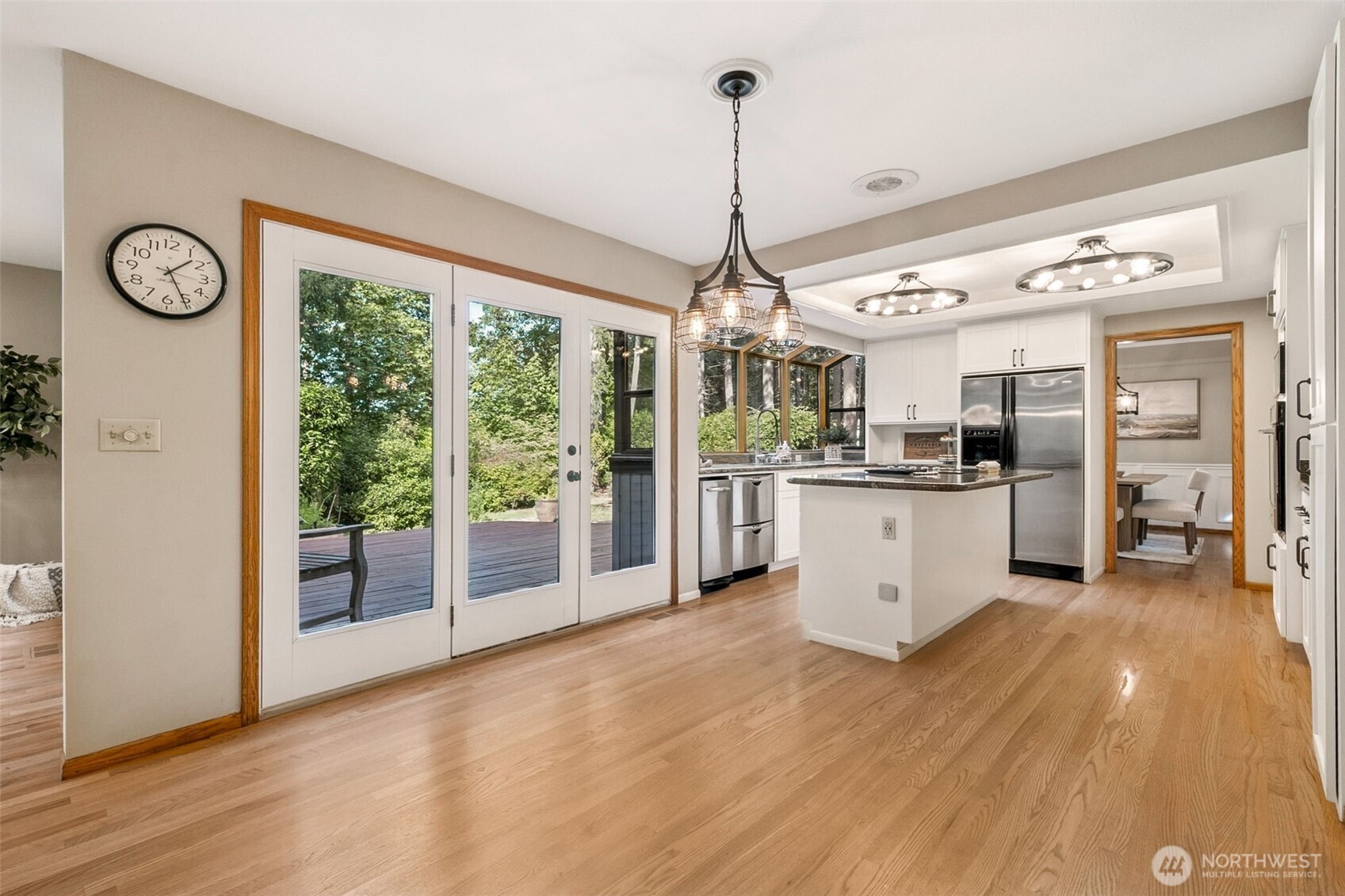 21720 Southeast 246th Street Maple Valley, WA 98038 - Photo 12 of 38 a view of a kitchen with stove and cabinets