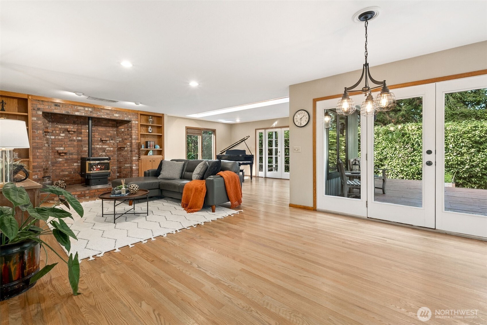 21720 Southeast 246th Street Maple Valley, WA 98038 - Photo 14 of 38 a view of a living room and dining room