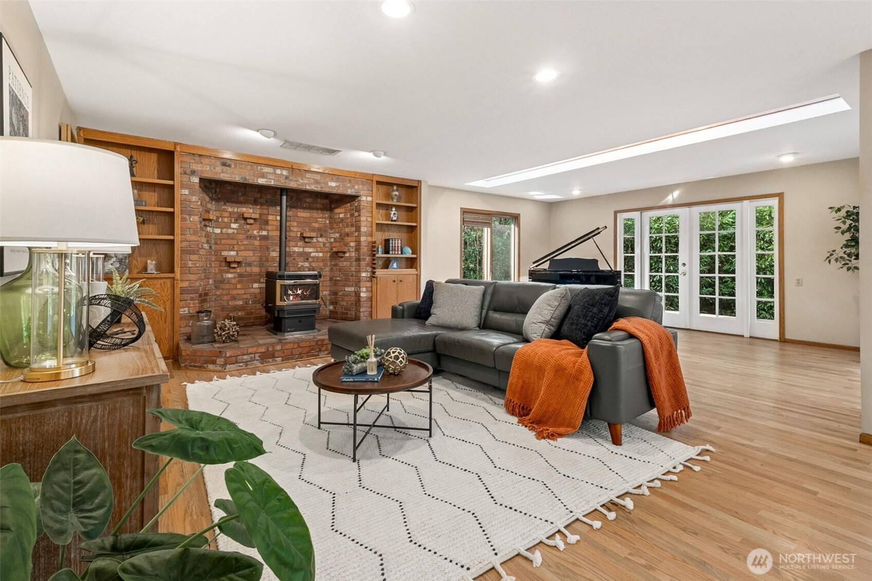 21720 Southeast 246th Street Maple Valley, WA 98038 - Photo 15 of 38 a living room with furniture and a large window