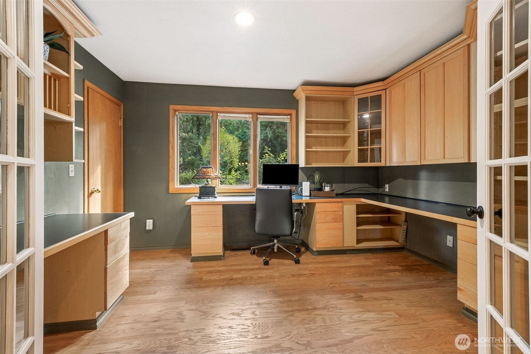 21720 Southeast 246th Street Maple Valley, WA 98038 - Photo 18 of 38 a kitchen with a stove a sink and a refrigerator