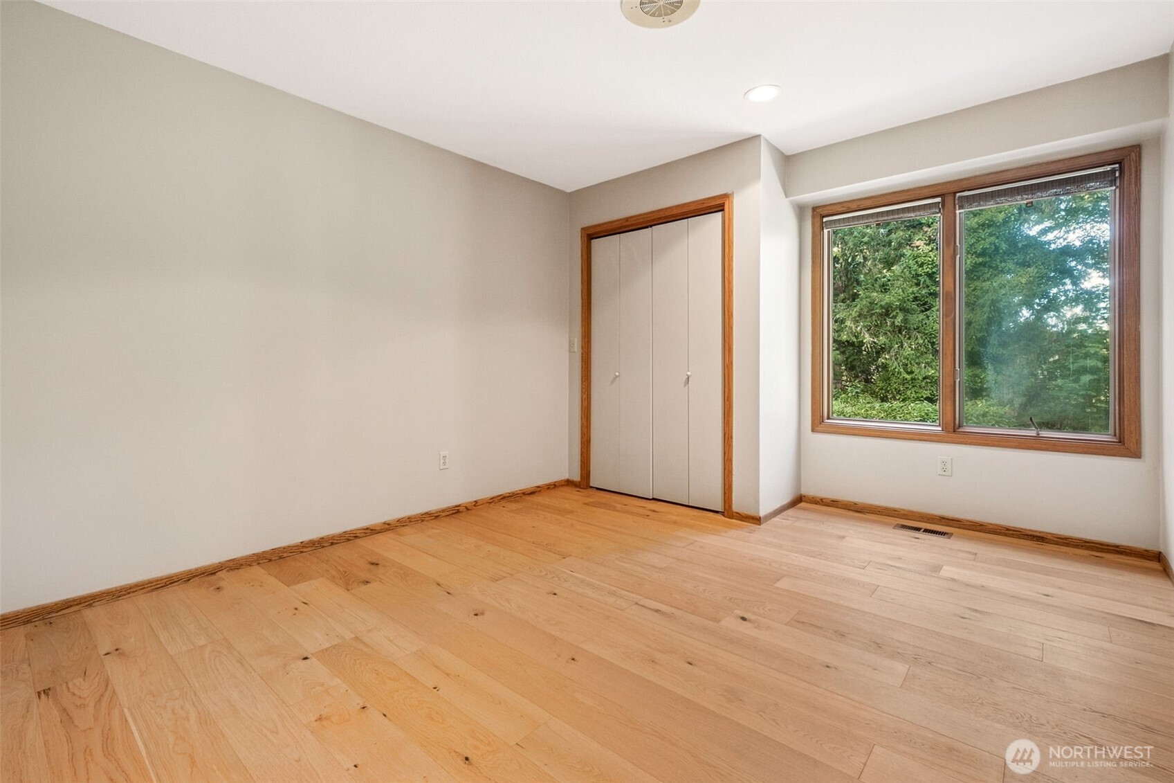 21720 Southeast 246th Street Maple Valley, WA 98038 - Photo 28 of 38 an empty room with large windows