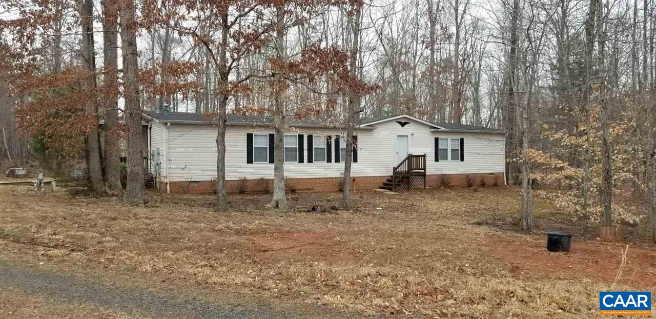 front view of a house with a dry yard