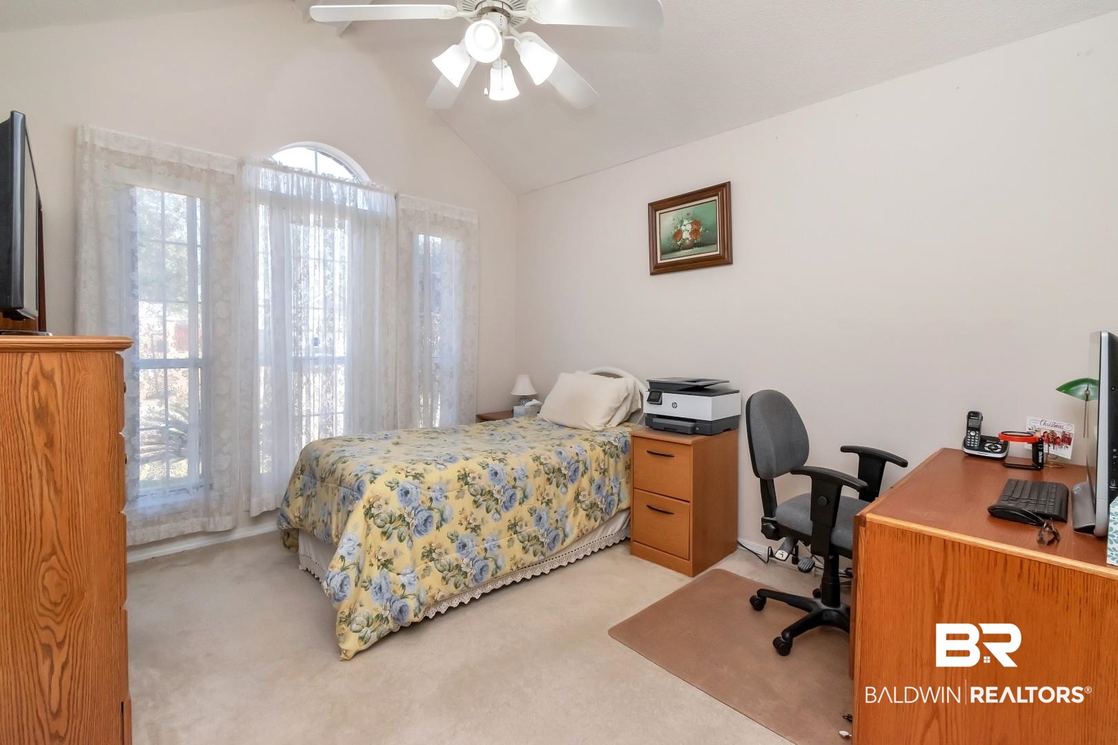 8221 Woodbend Drive Semmes, AL 36575 - Photo 25 of 35 Carpeted bedroom with ceiling fan and lofted ceiling