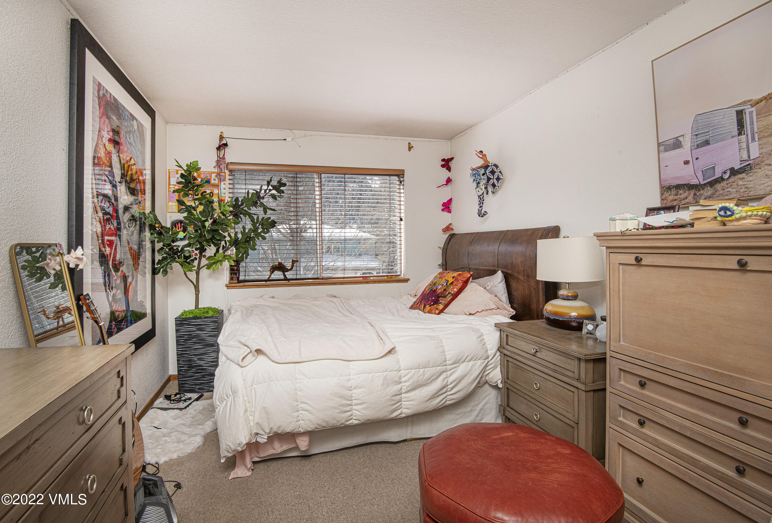 5175 Eaglebend Drive Avon, CO 81620 - Photo 11 of 23 a bedroom with furniture and a bed
