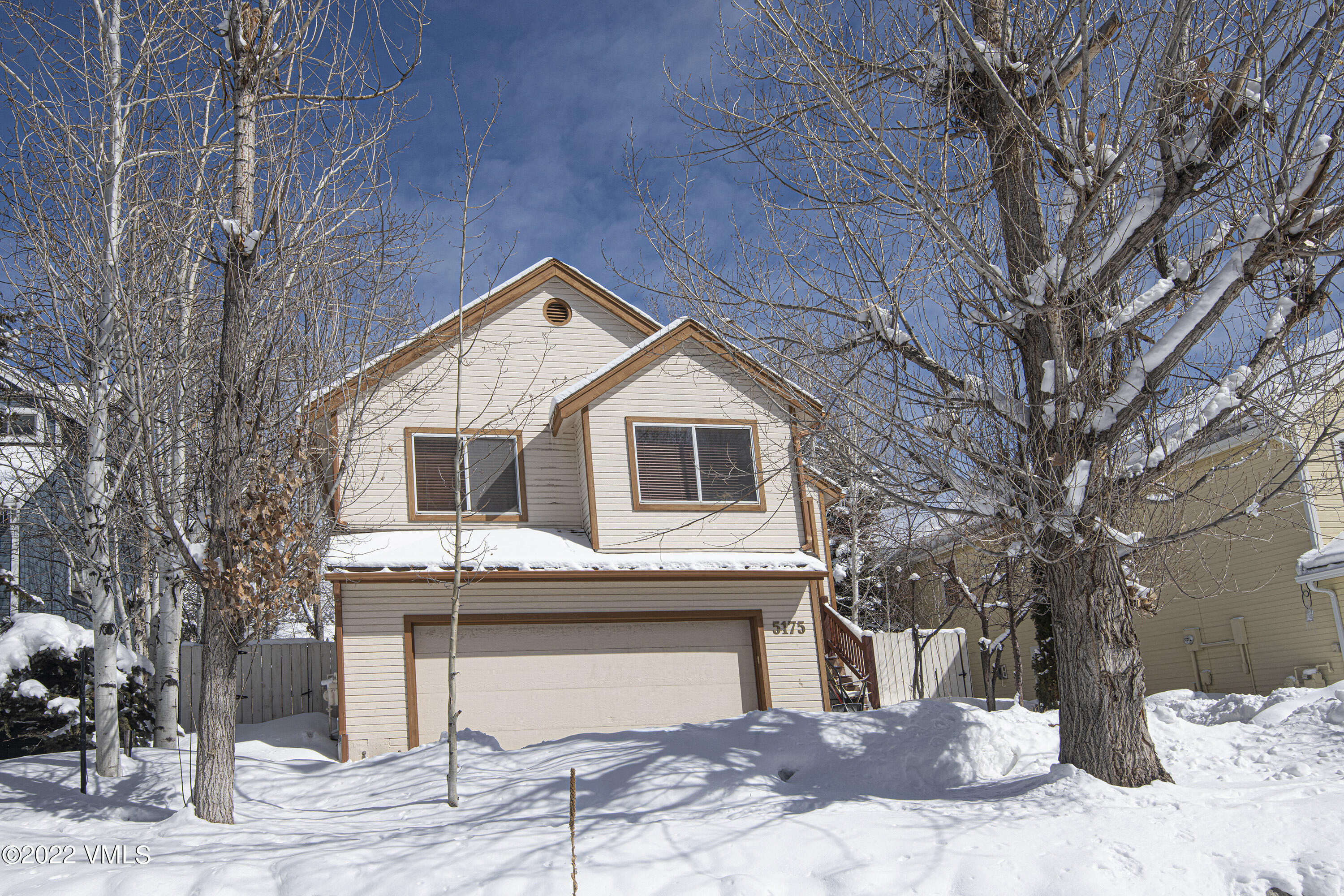 5175 Eaglebend Drive Avon, CO 81620 - Photo 22 of 23 a view of a house with a yard