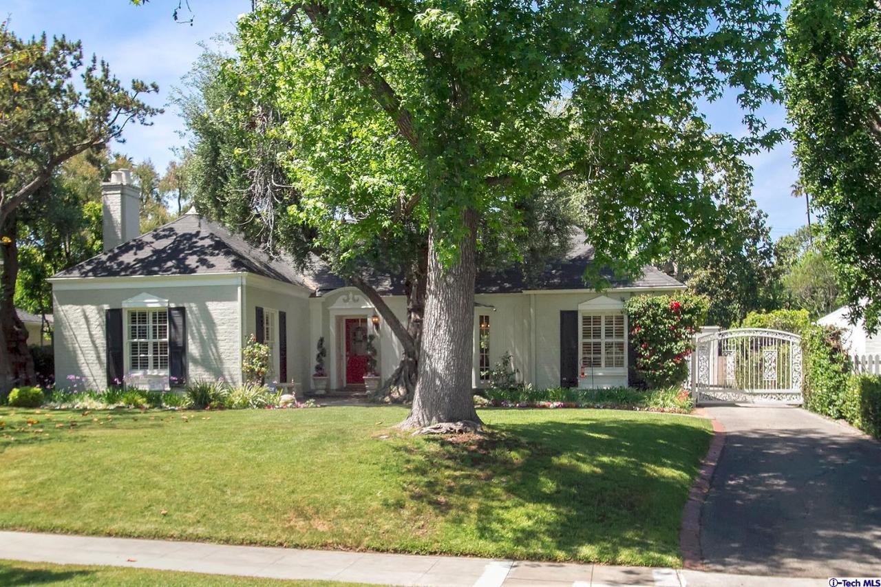 931 Roxbury Road San Marino, CA 91108 - Photo 1 of 37 front view of a house with a yard