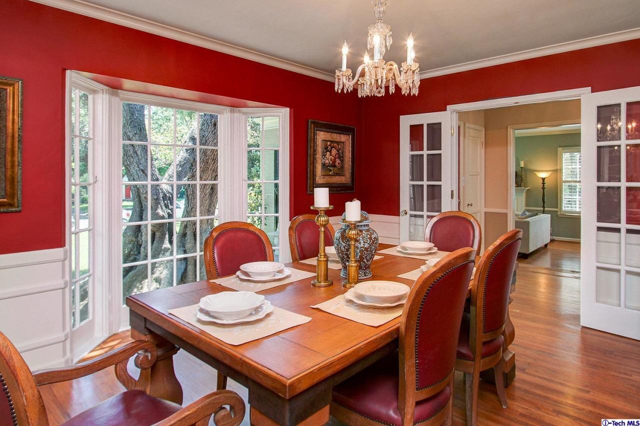 931 Roxbury Road San Marino, CA 91108 - Photo 12 of 37 a view of a dining room with furniture window and wooden floor