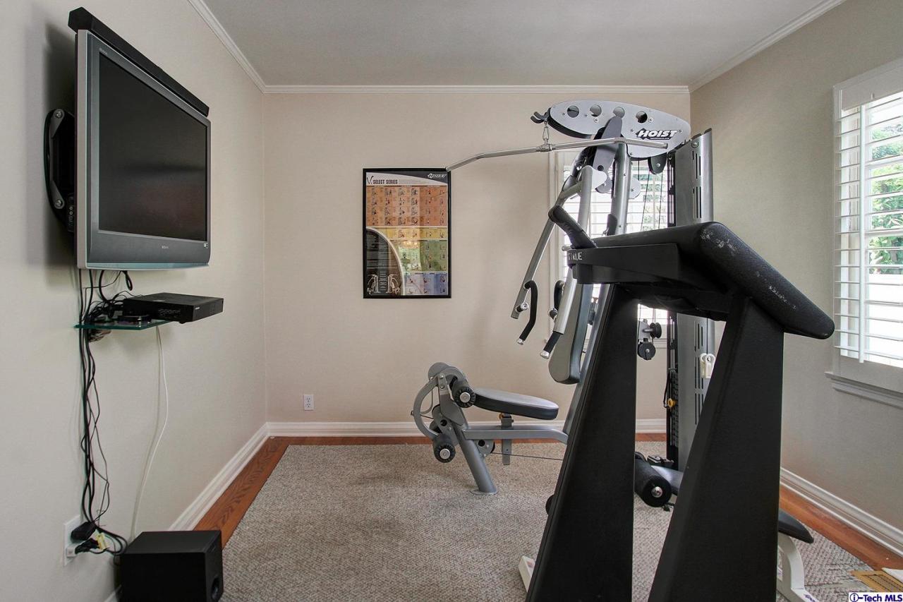 931 Roxbury Road San Marino, CA 91108 - Photo 18 of 37 a view of a livingroom with furniture and a flat screen tv