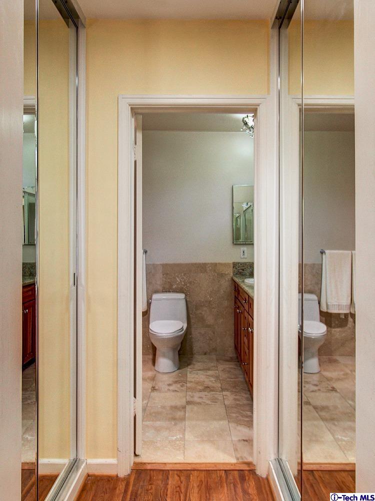 931 Roxbury Road San Marino, CA 91108 - Photo 21 of 37 a bathroom with a toilet and a view of bathroom