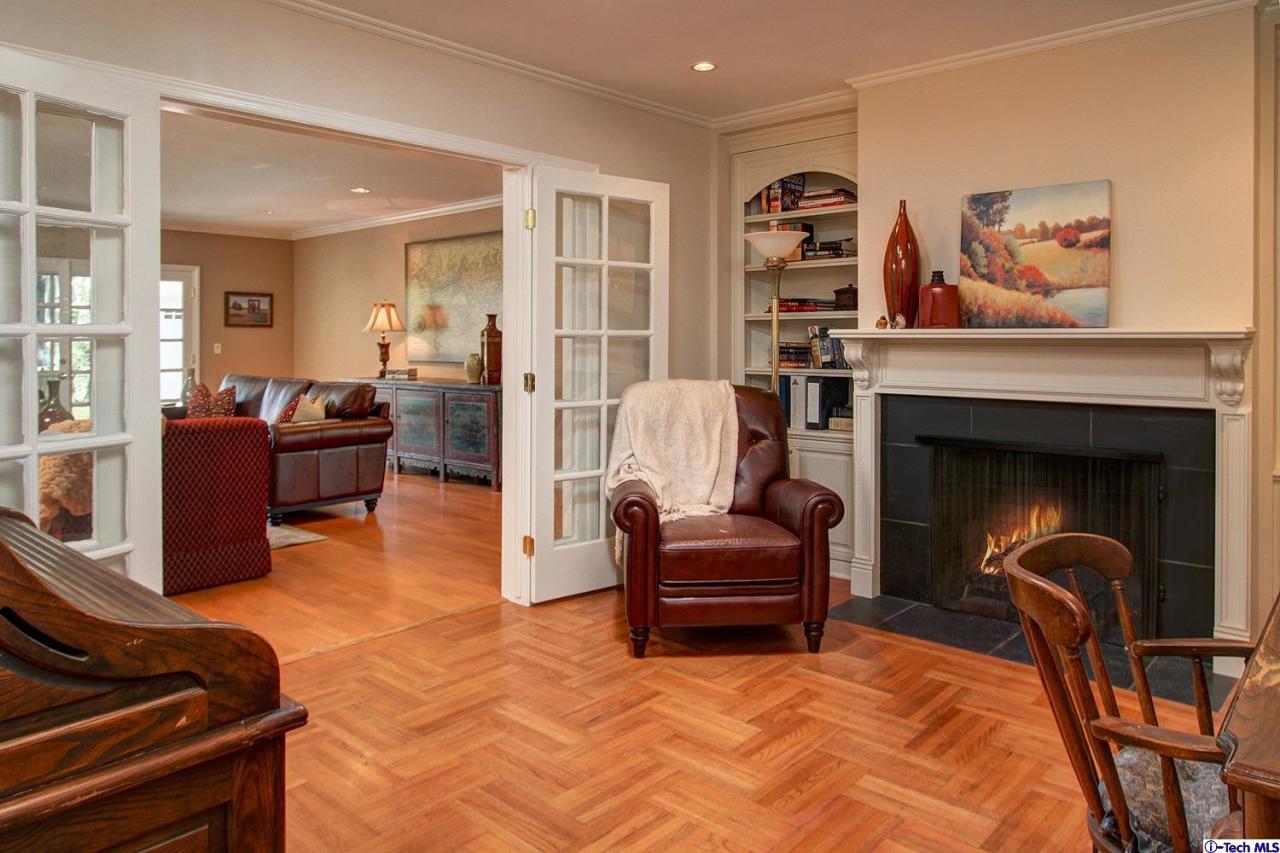 931 Roxbury Road San Marino, CA 91108 - Photo 27 of 37 a bedroom with furniture and a fireplace