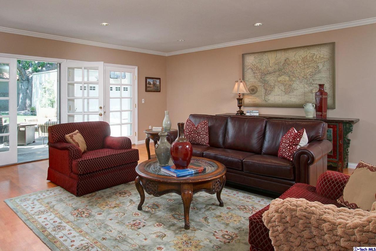 931 Roxbury Road San Marino, CA 91108 - Photo 29 of 37 a living room with furniture a rug and a large window