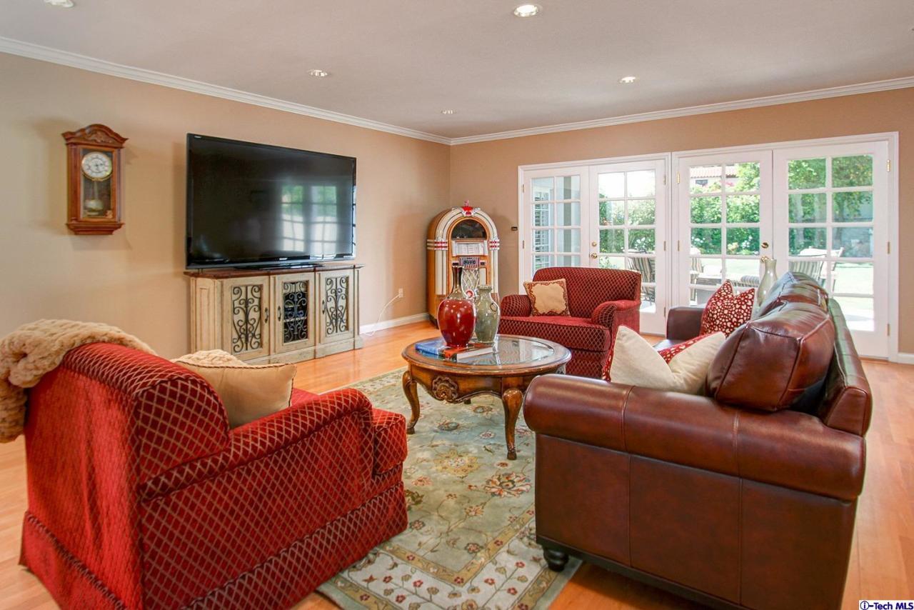 931 Roxbury Road San Marino, CA 91108 - Photo 30 of 37 a living room with furniture and a flat screen tv