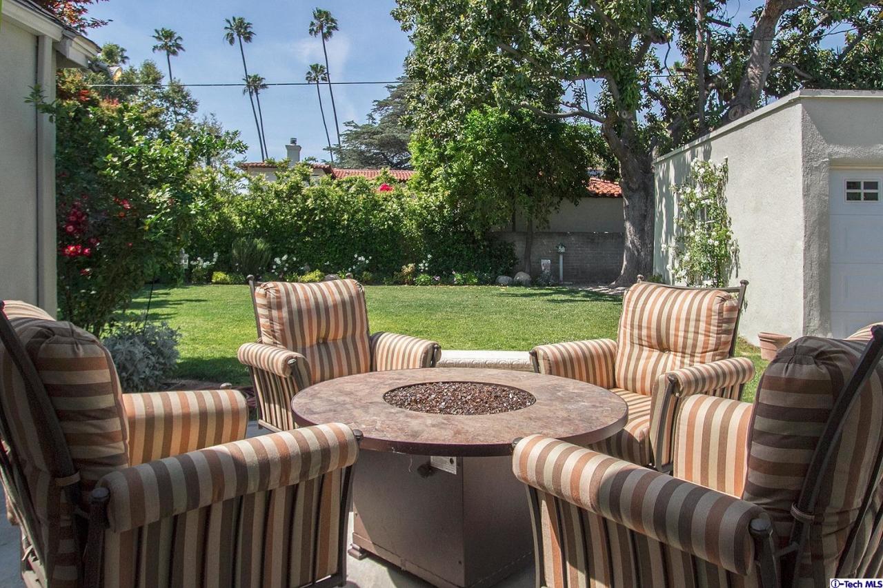 931 Roxbury Road San Marino, CA 91108 - Photo 31 of 37 a view of a patio with a yard