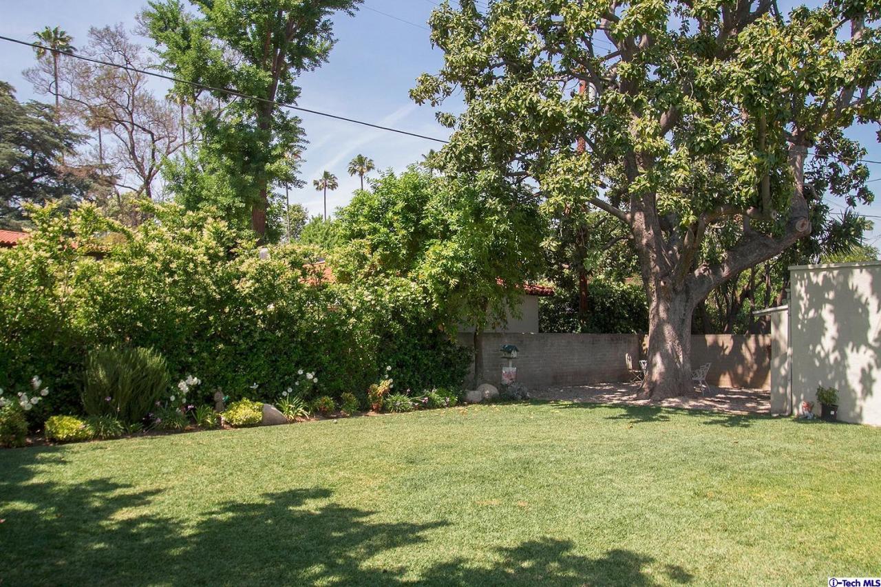 931 Roxbury Road San Marino, CA 91108 - Photo 33 of 37 a view of outdoor space with deck and trees