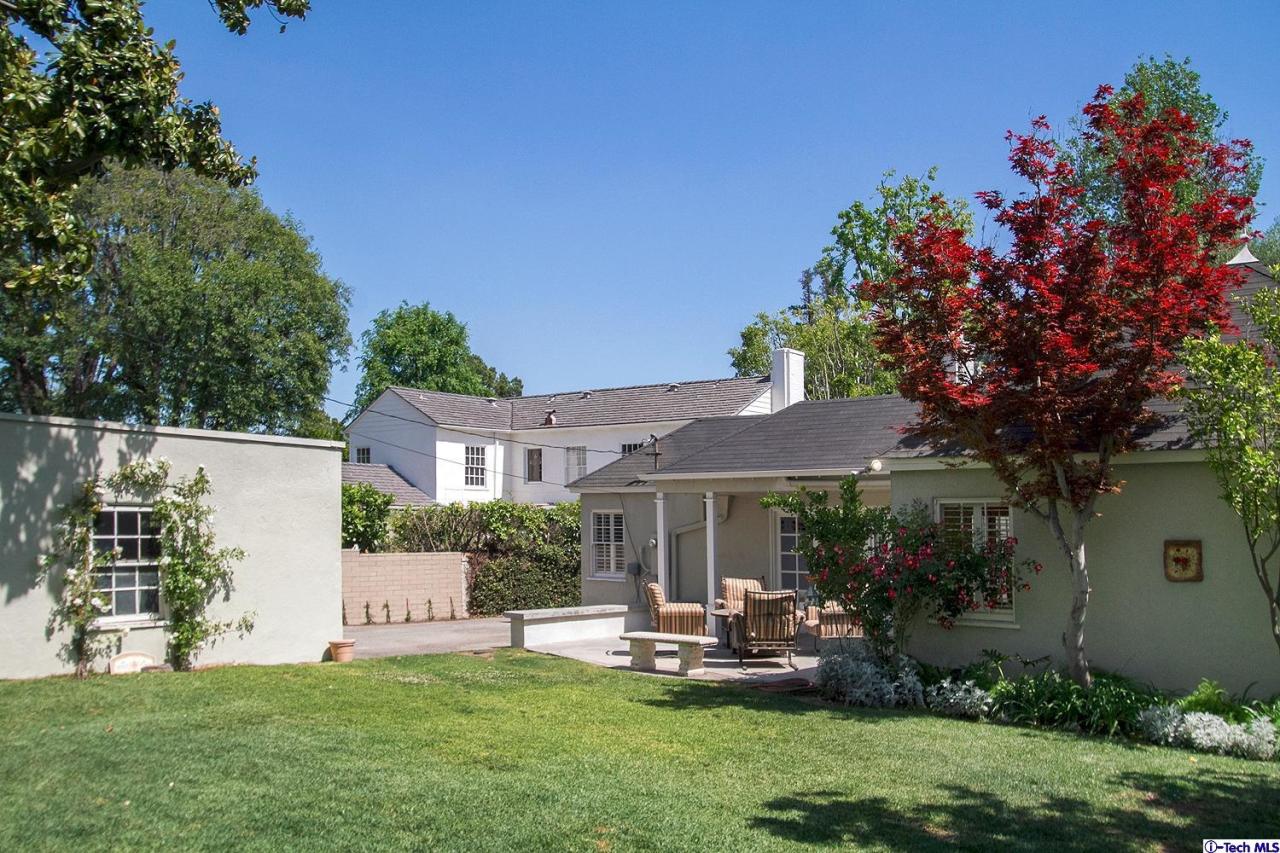 931 Roxbury Road San Marino, CA 91108 - Photo 34 of 37 a view of a house with backyard sitting area and garden