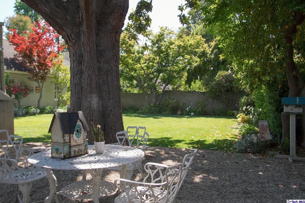 931 Roxbury Road San Marino, CA 91108 - Photo 36 of 37 a view of a yard with a tree