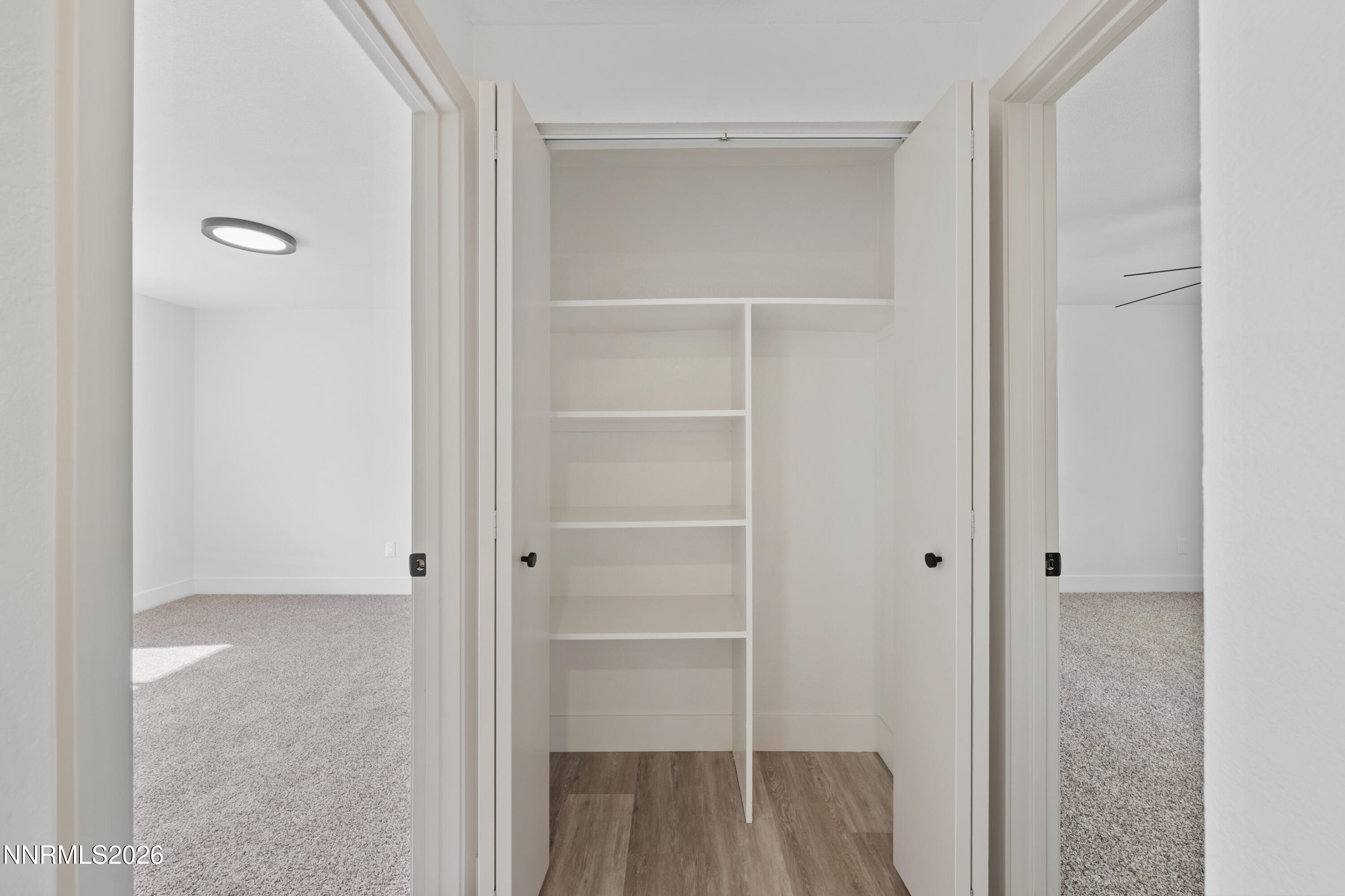 2240 Osceola Court Reno, NV 89506 - Photo 19 of 31 a view of walk in closet with empty racks