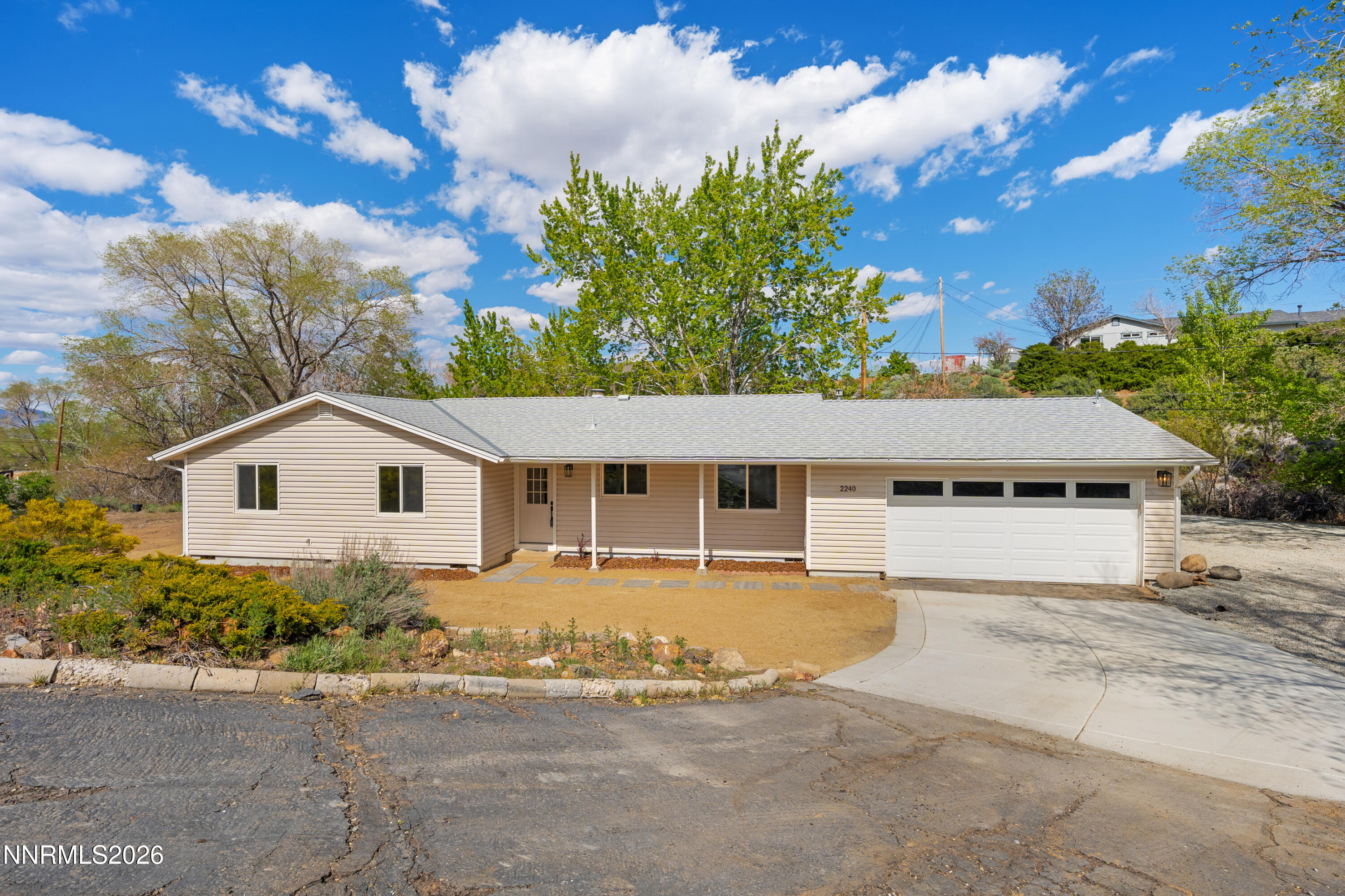 2240 Osceola Court Reno, NV 89506 - Photo 31 of 31 a house with trees in the background