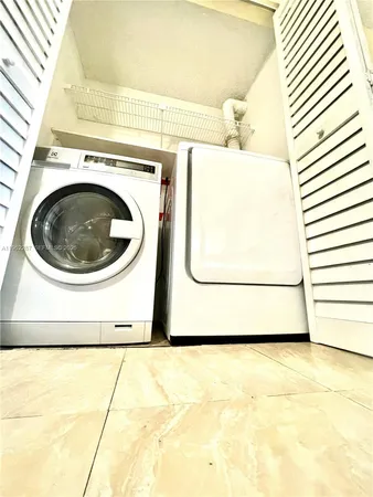 a utility room with a washer and dryer