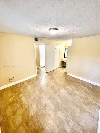 a view of a room with an empty space